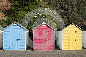 Colorful Beach Huts at Seaton, Devon, UK.