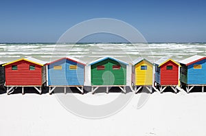 Colorful Beach Huts on White Sandy Beach