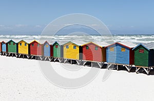 Colorful Beach Huts on White Sandy Beach
