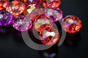 Colorful Beads on Black Background, Macro Shot