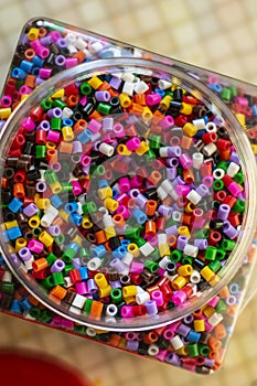 Colorful beads for crafts. Black and white.