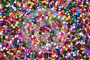 Colorful beads for crafts. Black and white.