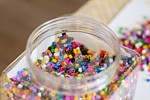 Colorful beads for crafts. Black and white.