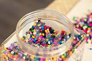 Colorful beads for crafts. Black and white.