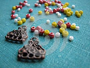 Colorful beads and pieces of earrings, handmade jewelry