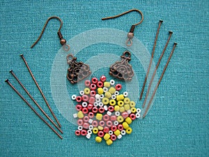 Colorful beads and pieces for making earrings, handmade jewelry