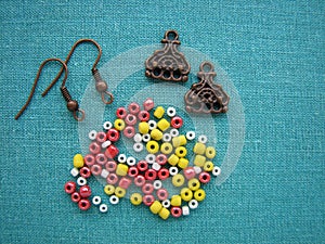 Colorful beads and pieces for making earrings, handmade jewelry