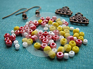 Colorful beads and pieces for making earrings, handmade jewelry