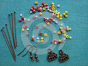 Colorful beads and pieces for making earrings, handmade jewelry