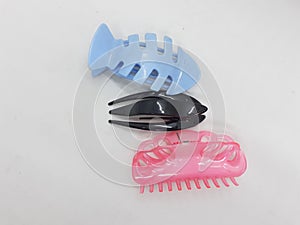 Colorful Beautiful Cute Hair Clip from Plastic Wood Rubber for Girl Fashion Accessories in White Isolated Background