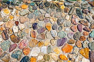 Colorful beautiful stones are washed by water. Background