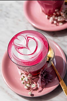Colorful beetroot super latte on marble background