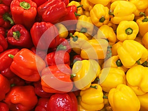 Colorful bell peppers in a basket with a super sale