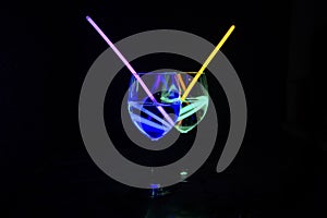 Colorful beverages with dark background for party, new year, bar and christmas with straw