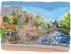 Colorful Bicycles on bridge over the canals of Amsterdam, Nether