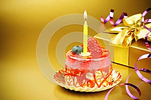 Colorful birthday cake with candle