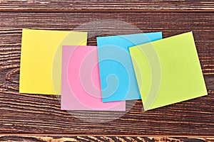 Colorful blank sticky notes with copy space.