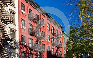 Colorful block of historic buildings in the East Village of New York City photo