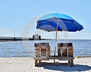 Colorful blue umbrella at beach