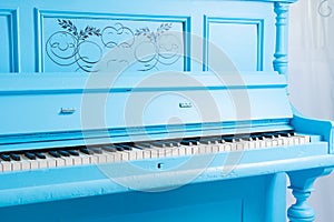 Colorful blue upright piano