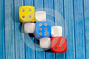 Colorful board game dice empty cubes top view, object closeup, top view, from above. Business integrity, simplicity abstract photo