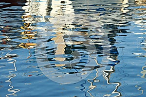 Colorful boat reflections at Chania port