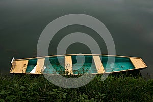 Colorful boat by the water