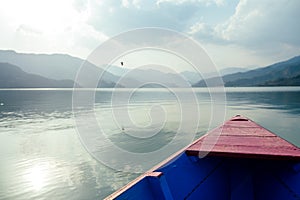 Colorful boats and a beautiful lake. concept of romance and active lifestyle