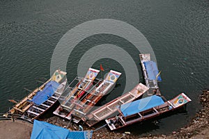 Colorful Boats in holy Narmada river in Omkareshwar