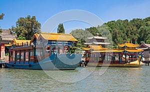 Colorful boats on Kunming Lake. Imperial Summer Palace in Beijing, China.