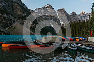 Colorful boats at Moraine Lake, Alberta, Canada