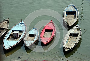 The colorful boats in the river.