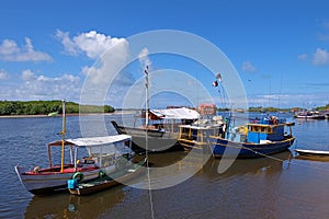 Colorful boats and ships at the little harbor of Santa Cruz Cabralia, Bahia, Brazil