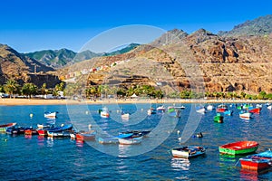 Colorful boats on Teresitas beach, in Tenerife, Spain