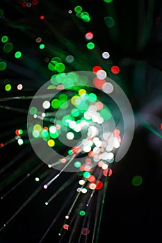 Colorful bokeh circle light celebrate at night, defocus light abstract green background.