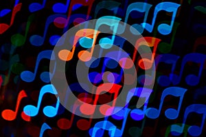 Colorful bokeh music note shape lights background. Melody music abstract background