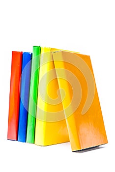 Colorful books on white background