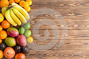 Colorful border of assorted fresh tropical fruit