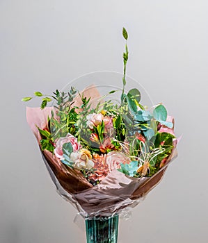 A colorful bouquet with roses and other flowers.. photo