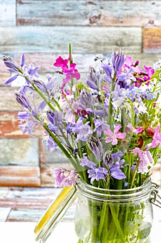 Colorful bouquet with spring wild hyacints and another meadow f