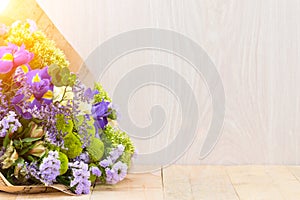 colorful bouquet on wooden background