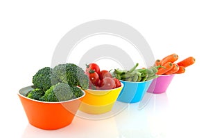 Colorful bowls with vegetables