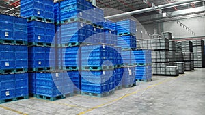 The colorful boxes (blue) stocked in the warehouse