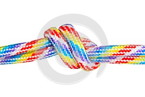 Colorful braided cords knotted together isolated