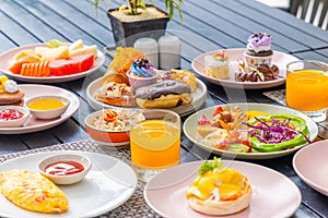 Colorful breakfast spread on table with