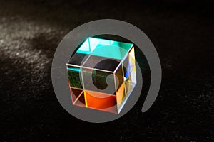 Colorful bright glass prism cube  Refracting light in vivid rainbow colors