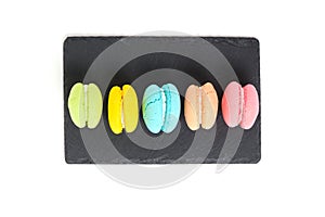 Colorful and bright macarons cookies white background