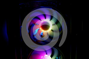 Colorful bright rainbow led rgb pc fan air case cooler. Computer chassis. Gaming modding, technology concept and IT background photo