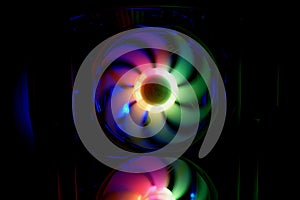 Colorful bright rainbow led rgb pc fan air case cooler. Computer chassis. Gaming modding, technology concept and IT background