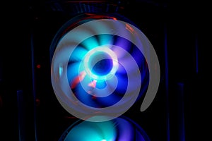 Colorful bright rainbow led rgb pc fan air case cooler. Computer chassis. Gaming modding, technology concept and IT background